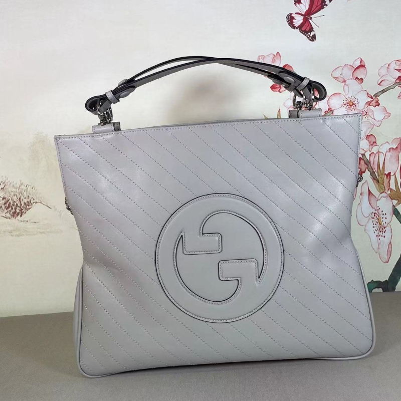 G*u*i top handle bags